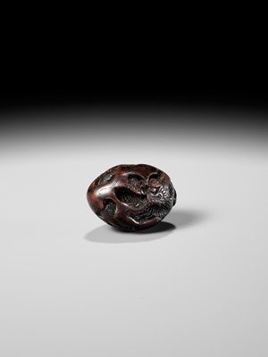 NAITO TOYOMASA: A FINE WOOD NETSUKE OF A DRAGON EMERGING FROM AN EGG