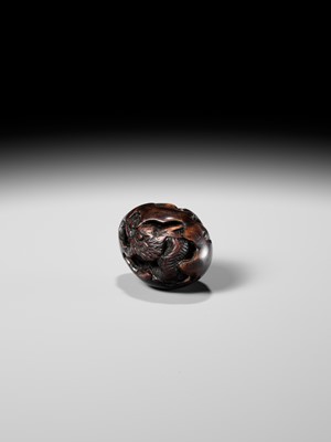 NAITO TOYOMASA: A FINE WOOD NETSUKE OF A DRAGON EMERGING FROM AN EGG