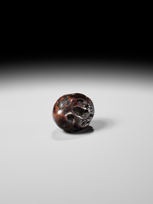 NAITO TOYOMASA: A FINE WOOD NETSUKE OF A DRAGON EMERGING FROM AN EGG