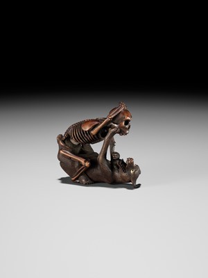 Lot 98 - A FINE WOOD NETSUKE OF A WOLF AND SKELETON, ATTRIBUTED TO SHOKO SUGONOYA