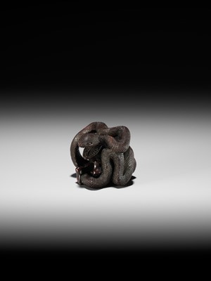 A VERY RARE SHUNGA WOOD NETSUKE OF A NAKED WOMAN AND GIANT SNAKE