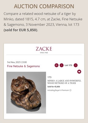 Lot 457 - MINKO: A POWERFUL WOOD NETSUKE OF A TIGER