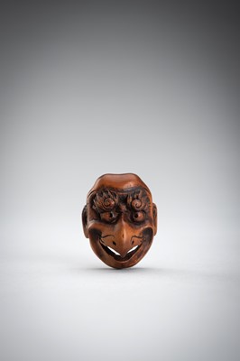 Lot 492 - GYOKUSHUN: A WOOD MASK NETSUKE OF A KARASU TENGU