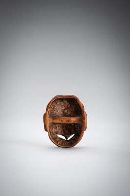 Lot 492 - GYOKUSHUN: A WOOD MASK NETSUKE OF A KARASU TENGU