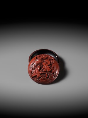 A CINNABAR LACQUER ‘BOYS AT PLAY’ SEAL PASTE BOX AND COVER, 16TH-17TH CENTURY