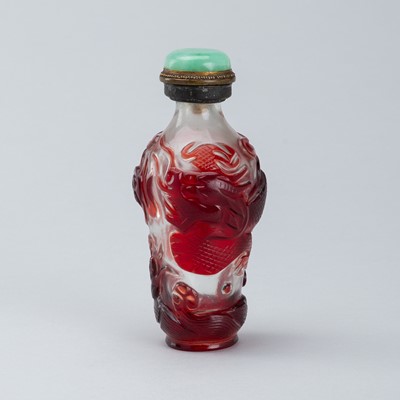 Lot 1798 - A LARGE RED OVERLY GLASS `DRAGON` SNUFF BOTTLE, XIANFENG MARK AND POSSIBLY OF THE PERIOD