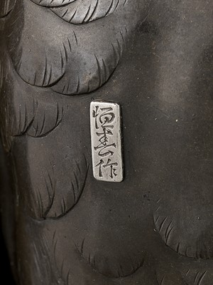 Lot 39 - TSUNEHARU: AN IMPRESSIVE PARCEL-GILT AND PATINATED BRONZE OKIMONO OF A KESTREL