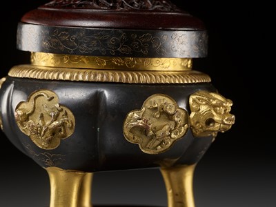 Lot 75 - A SAWASA GILT BRONZE CENSER WITH MATCHING HARDWOOD STAND, COVER AND WHITE JADE FINIAL, 17TH-18TH CENTURY