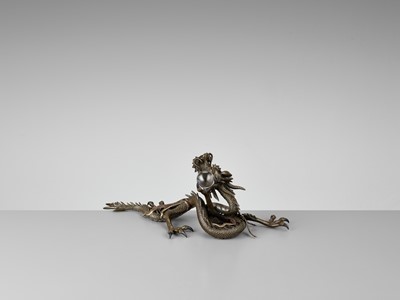 Lot 25 - A BRONZE OKIMONO OF A DRAGON WITH ROCK CRYSTAL BALL