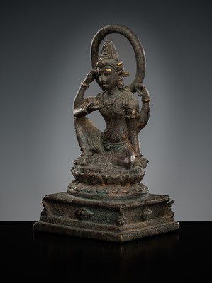 Lot 605 - A BRONZE FIGURE OF AVALOKITESHVARA, JAVA, 9TH-10TH CENTURY