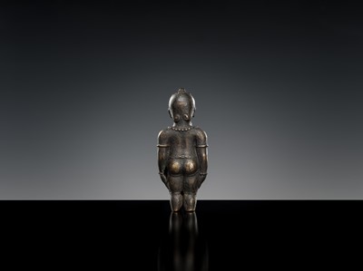 Lot 413 - A BRONZE FIGURE FRAGMENT OF A NOBLE BOY, MAJAPAHIT, 14TH CENTURY