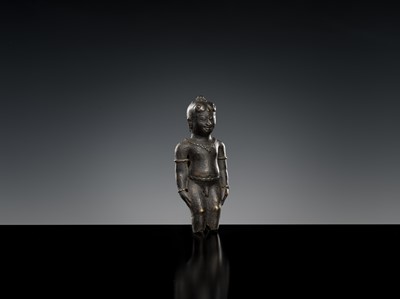 Lot 413 - A BRONZE FIGURE FRAGMENT OF A NOBLE BOY, MAJAPAHIT, 14TH CENTURY