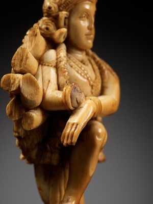 Lot 260 - A CARVED IVORY FIGURE OF VISHNU, INDIA, 17TH-18TH CENTURY