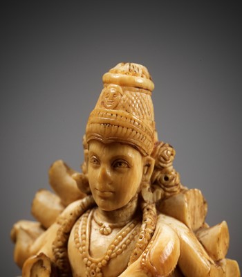 Lot 260 - A CARVED IVORY FIGURE OF VISHNU, INDIA, 17TH-18TH CENTURY