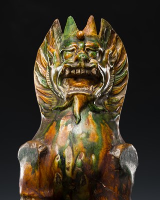 Lot 132 - A SANCAI-GLAZED FIGURE OF A LEONINE EARTH SPIRIT, ZHENMU SHOU, TANG DYNASTY