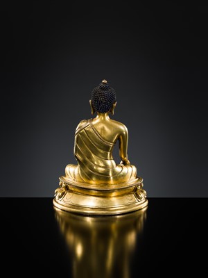 Lot 21 - A GILT BRONZE FIGURE OF BUDDHA SHAKYAMUNI, TIBET, 18TH – 19th CENTURY