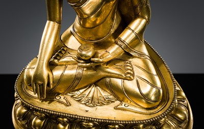 Lot 21 - A GILT BRONZE FIGURE OF BUDDHA SHAKYAMUNI, TIBET, 18TH – 19th CENTURY