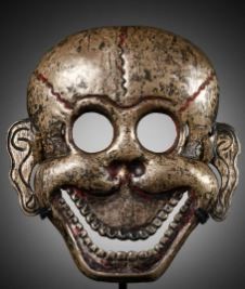 Lot 2 - A SILVER REPOUSSÉ MASK OF A CHITIPATI, TIBET, 18TH-19TH CENTURY