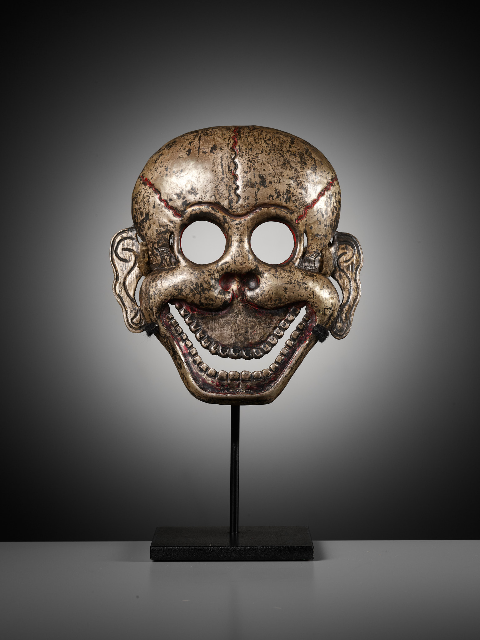 Lot 2 - A SILVER REPOUSSÉ MASK OF A CHITIPATI, TIBET,