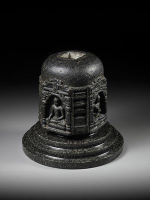 Lot 249 - A BLACK STONE STUPA DRUM WITH FOUR BUDDHAS, PALA PERIOD