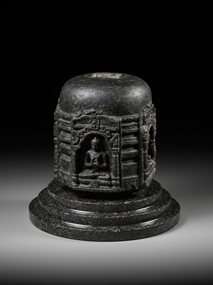 Lot 249 - A BLACK STONE STUPA DRUM WITH FOUR BUDDHAS, PALA PERIOD
