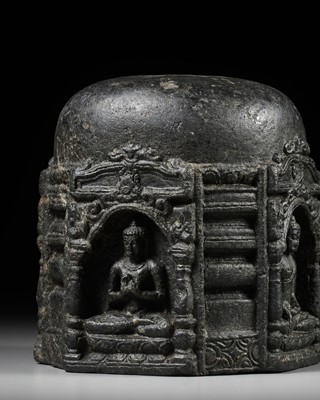 Lot 249 - A BLACK STONE STUPA DRUM WITH FOUR BUDDHAS, PALA PERIOD