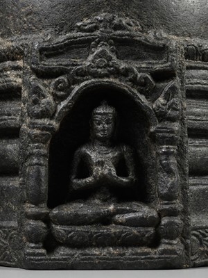 Lot 249 - A BLACK STONE STUPA DRUM WITH FOUR BUDDHAS, PALA PERIOD