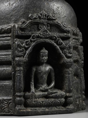Lot 249 - A BLACK STONE STUPA DRUM WITH FOUR BUDDHAS, PALA PERIOD
