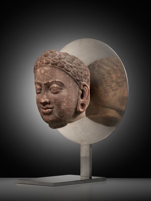 Lot 241 - A RARE MOTTLED RED SANDSTONE HEAD OF A JAIN TIRTHANKARA, MATHURA, KUSHAN PERIOD