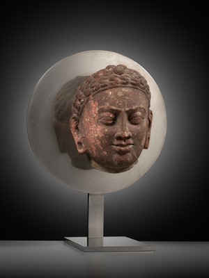 Lot 241 - A RARE MOTTLED RED SANDSTONE HEAD OF A JAIN TIRTHANKARA, MATHURA, KUSHAN PERIOD