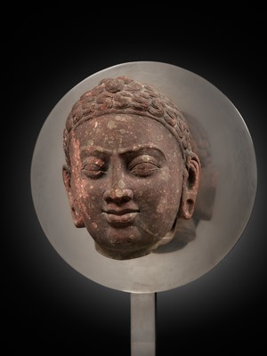 Lot 241 - A RARE MOTTLED RED SANDSTONE HEAD OF A JAIN TIRTHANKARA, MATHURA, KUSHAN PERIOD