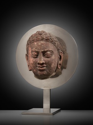 Lot 241 - A RARE MOTTLED RED SANDSTONE HEAD OF A JAIN TIRTHANKARA, MATHURA, KUSHAN PERIOD