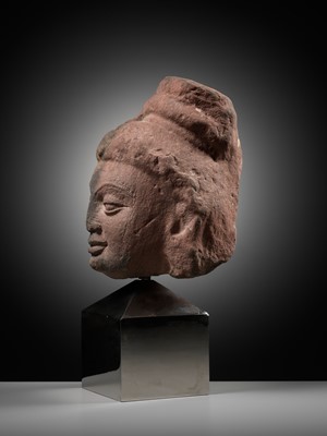 Lot 629 - A RARE MOTTLED RED SANDSTONE HEAD OF A YAKSHI, MATHURA