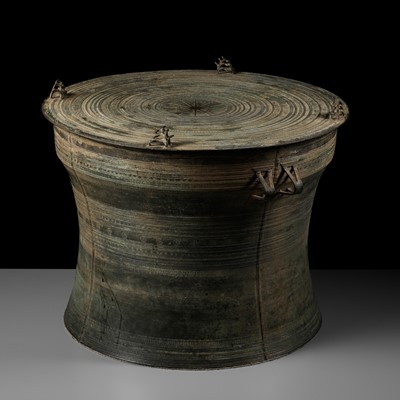 Lot 164 - A MASSIVE BRONZE RAIN DRUM, KAREN PEOPLE, REGION OF MYANMAR AND THAILAND, 19TH CENTURY OR EARLIER