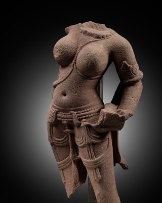 Lot 633 - A PINK SANDSTONE TORSO OF A GODDESS, MADHYA PRADESH, 11TH-12TH CENTURY