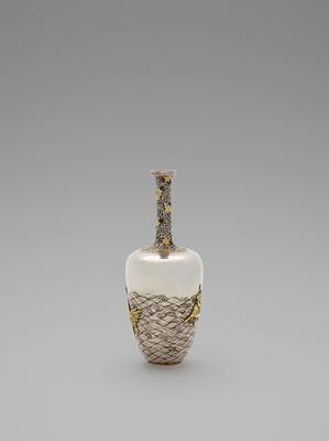 Lot 35 - A SPECTACULAR GOLD-INLAID ‘KIRIN AND WAVES’ SILVER VASE