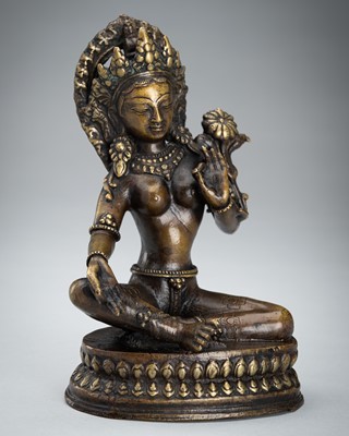 Lot 1487 - A NEPALESE BRONZE FIGURE OF GREEN TARA, c. 1900s