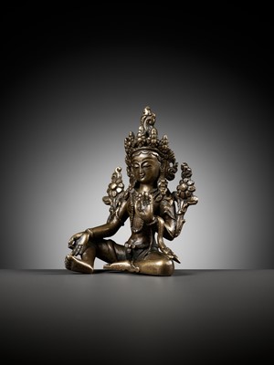 Lot 22 - A COPPER ALLOY FIGURE OF GREEN TARA, NEPAL, 18TH - 19TH CENTURY