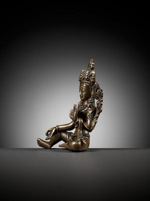 Lot 22 - A COPPER ALLOY FIGURE OF GREEN TARA, NEPAL, 18TH - 19TH CENTURY