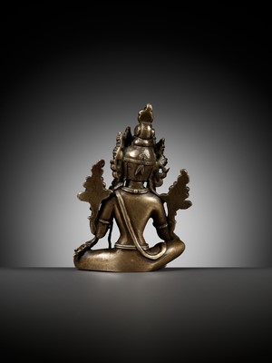 Lot 22 - A COPPER ALLOY FIGURE OF GREEN TARA, NEPAL, 18TH - 19TH CENTURY