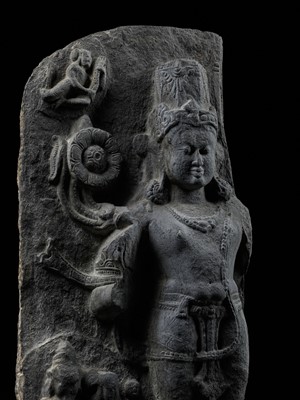 Lot 248 - A LARGE SCHIST STELE OF SURYA, PALA PERIOD, 10TH-12TH CENTURY