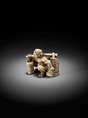 Lot 500 - RYOZAN: AN AMUSING IVORY NETSUKE OF AN ONI CARRYING A BONSHO AND CHOCHIN, CHOCHIN NI TSURIGANE