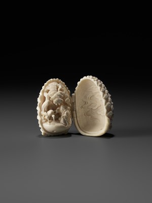 Lot 76 - KAIGYOKU MASATSUGU: A FINE IVORY NETSUKE OF JO AND UBA INSIDE A PINECONE