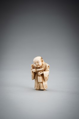 Lot 587 - TOMOKAZU: A FINE IVORY NETSUKE OF FUKUSUKE INSPECTING A NETSUKE ATTACHED TO AN INRO