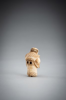 Lot 587 - TOMOKAZU: A FINE IVORY NETSUKE OF FUKUSUKE INSPECTING A NETSUKE ATTACHED TO AN INRO