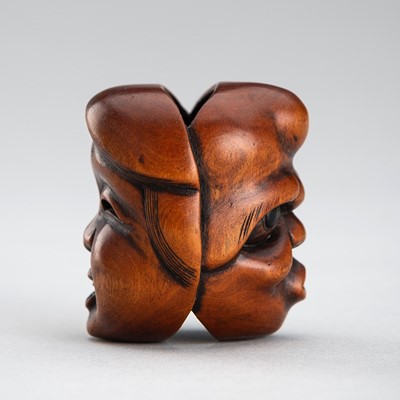 Lot 491 - MASANAO: A WOOD ‘DOUBLE MASK’ NETSUKE OF OKAME AND HYOTTOKO