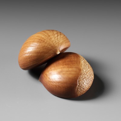 Lot 216 - ANDO RYOKUZAN: A FINE LACQUERED IVORY NETSUKE OF TWO CHESTNUTS