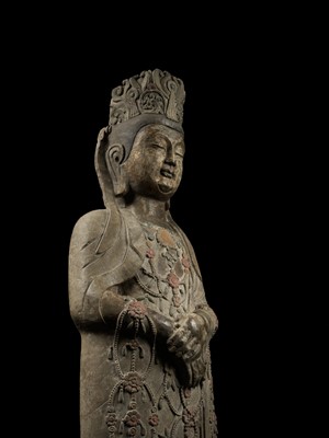 A RARE AND MONUMENTAL PAINTED LIMESTONE FIGURE OF A BODHISATTVA, SUI DYNASTY