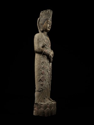 A RARE AND MONUMENTAL PAINTED LIMESTONE FIGURE OF A BODHISATTVA, SUI DYNASTY