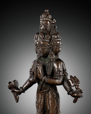 Lot 21 - A BRONZE FIGURE OF SADASHIVA, NEPAL, 17TH-18TH CENTURY